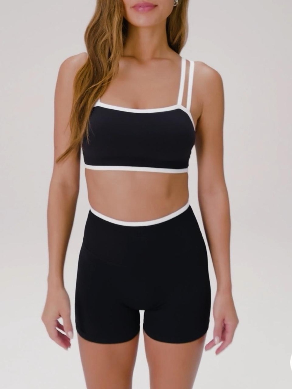 Black and white sportswear bra and shorts
set
